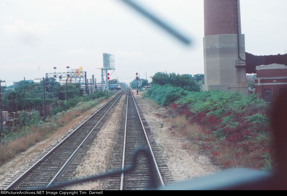 Approaching junction with RTA train crossing in the distance.